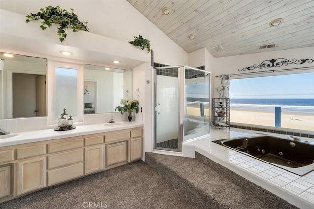 bathroom with a water view, wooden ceiling, a beach view, shower with separate bathtub, and lofted ceiling