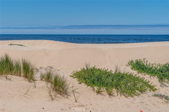 view of water feature with a view of the beach