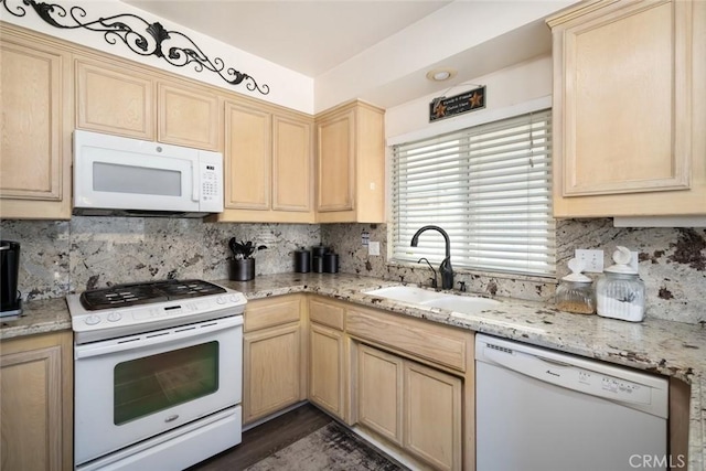 kitchen with sink, light brown cabinets, dark wood-type flooring, white appliances, and decorative backsplash