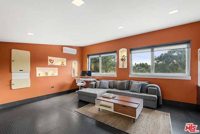 living room featuring an AC wall unit and vaulted ceiling