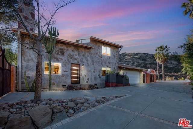 view of front of house with a garage