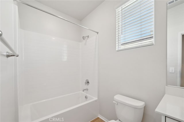 full bathroom featuring vanity,  shower combination, and toilet