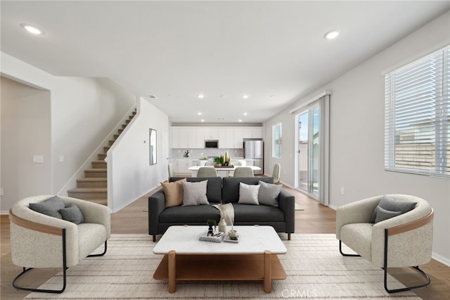 living room with light hardwood / wood-style floors