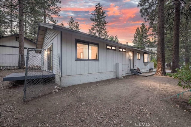 2028 Manzanita Ln, Big Bear City, CA 92314 - back of house at dusk with entry steps