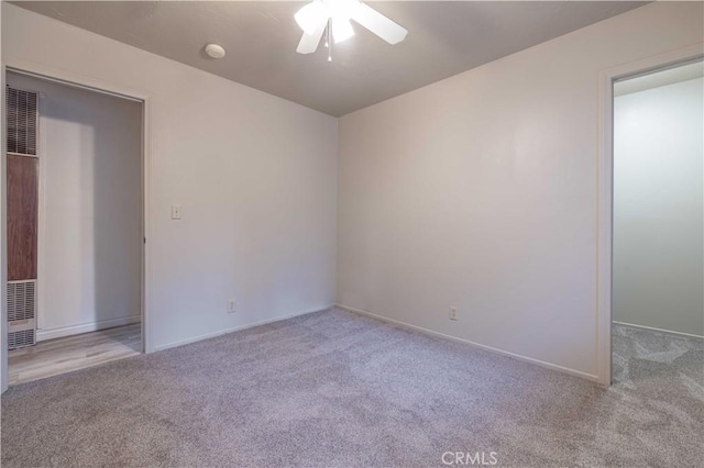2028 Manzanita Ln, Big Bear City, CA 92314 - unfurnished bedroom featuring carpet floors, a heating unit, and ceiling fan