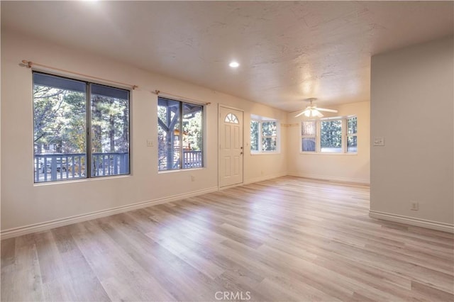 2028 Manzanita Ln, Big Bear City, CA 92314 - spare room with light wood finished floors, recessed lighting, and a ceiling fan