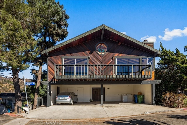 view of front of house with a carport