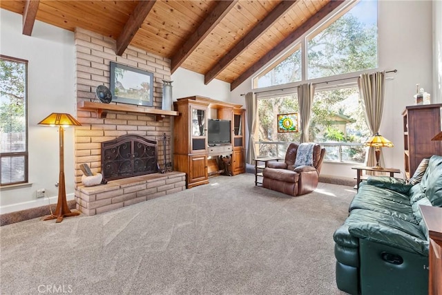 carpeted living room with beamed ceiling, wood ceiling, high vaulted ceiling, and a brick fireplace