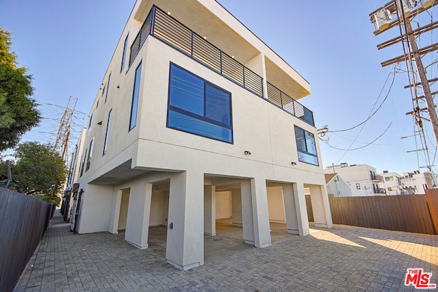 rear view of property with a patio