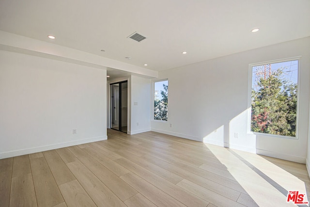 empty room featuring light wood-type flooring