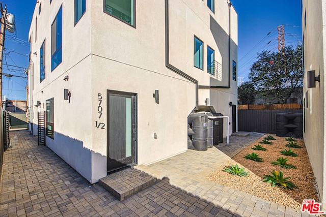 back of property with a patio area