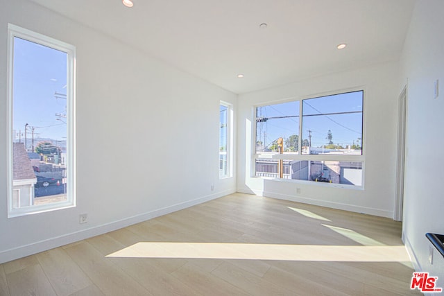 empty room featuring light hardwood / wood-style floors