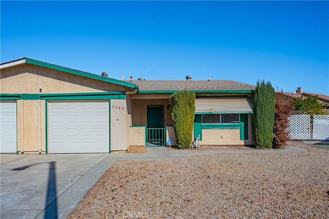 ranch-style home featuring a garage