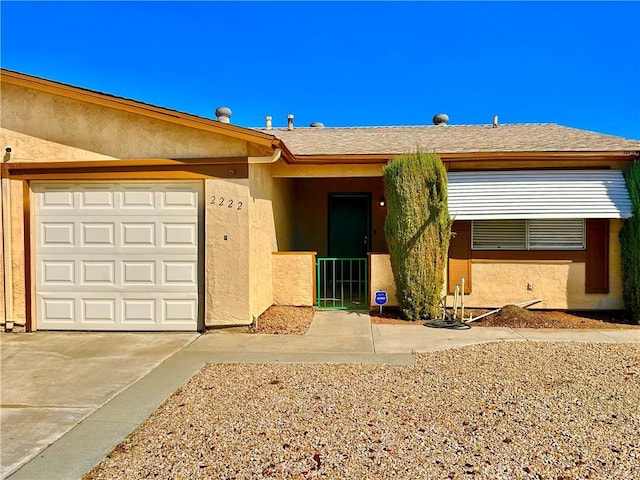 ranch-style house with a garage