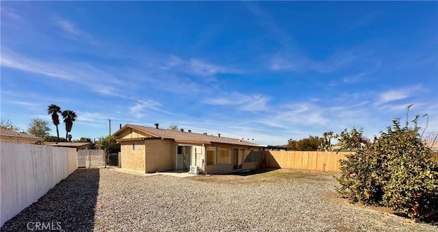 rear view of house featuring a patio area