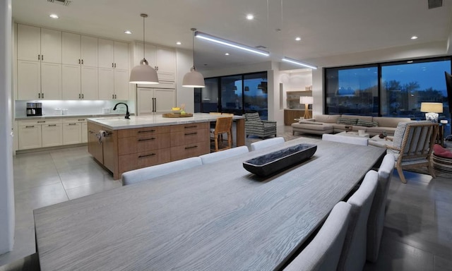 dining space featuring sink