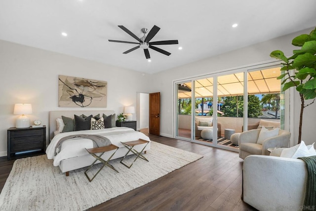 bedroom featuring ceiling fan, access to exterior, and dark hardwood / wood-style flooring