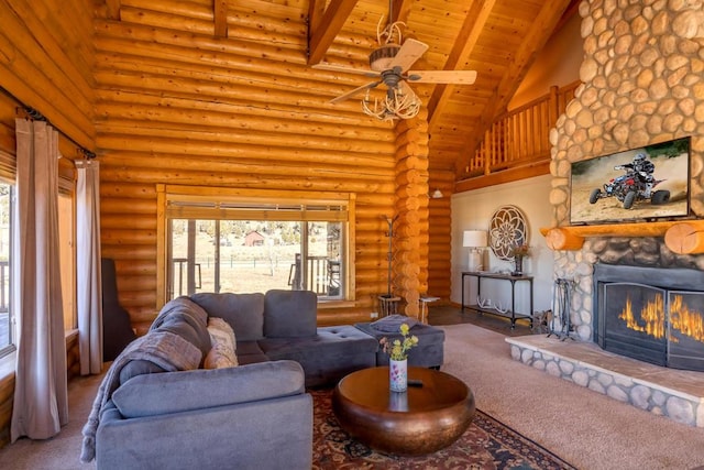 carpeted living room featuring wooden ceiling, high vaulted ceiling, ceiling fan, a fireplace, and beamed ceiling