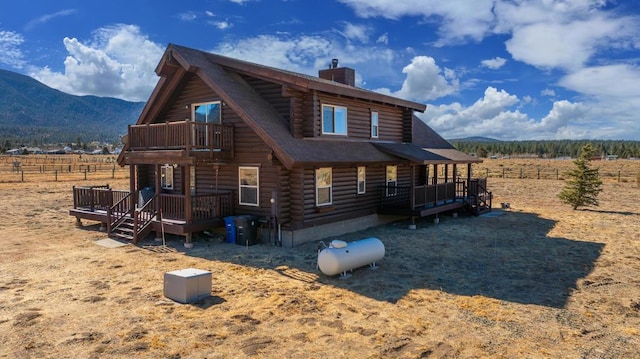 exterior space with a mountain view and a rural view