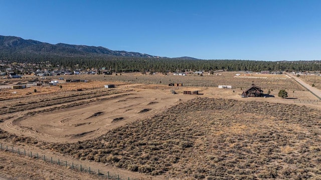 mountain view featuring a rural view