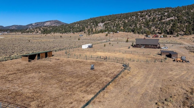 aerial view featuring a mountain view and a rural view