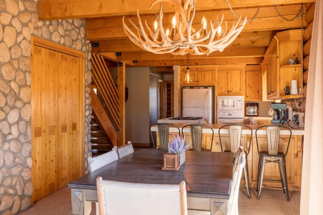 carpeted dining space with an inviting chandelier