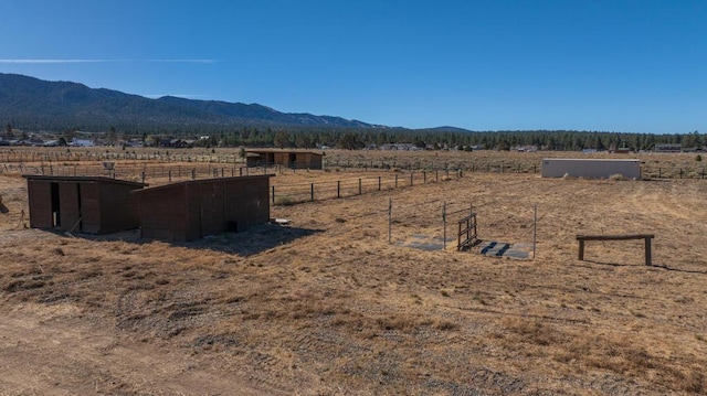 mountain view featuring a rural view