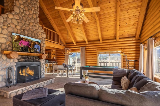 living room with rustic walls, ceiling fan, a stone fireplace, and high vaulted ceiling