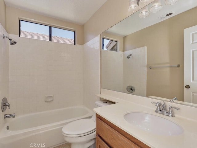 full bathroom featuring toilet,  shower combination, and vanity