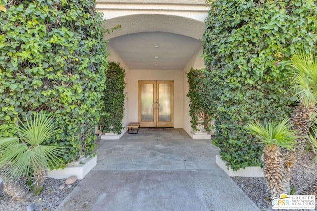 doorway to property featuring french doors