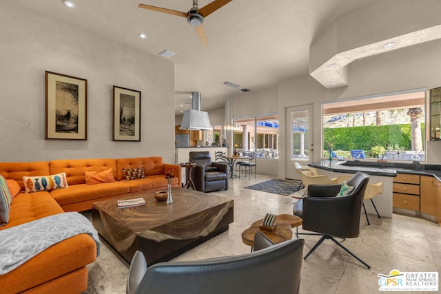 living room featuring ceiling fan