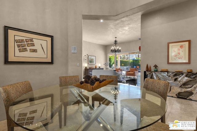 dining room with a notable chandelier