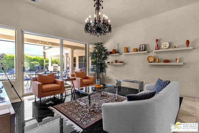 living room featuring an inviting chandelier