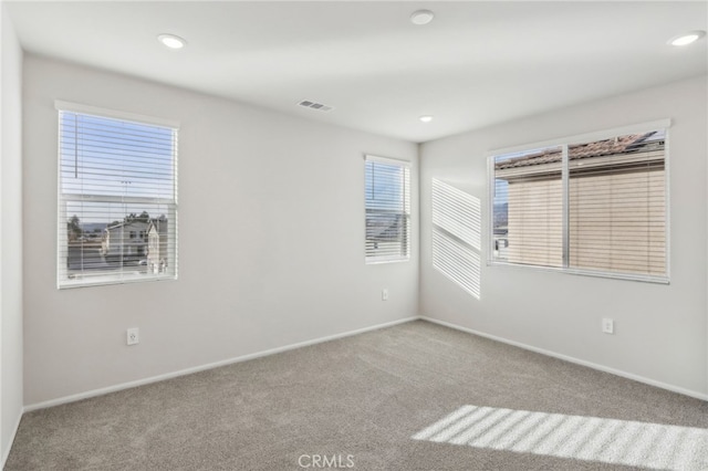 view of carpeted spare room