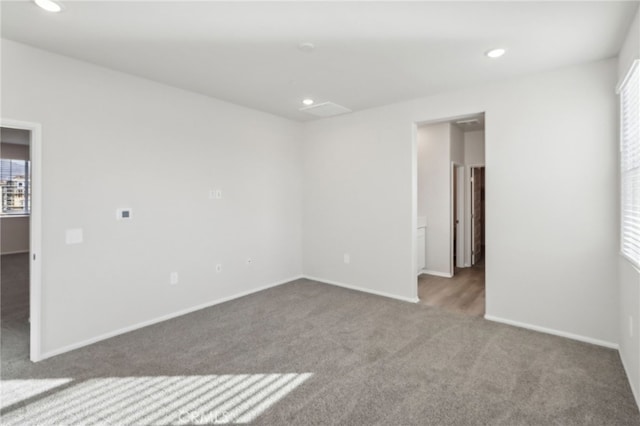 unfurnished room featuring carpet floors