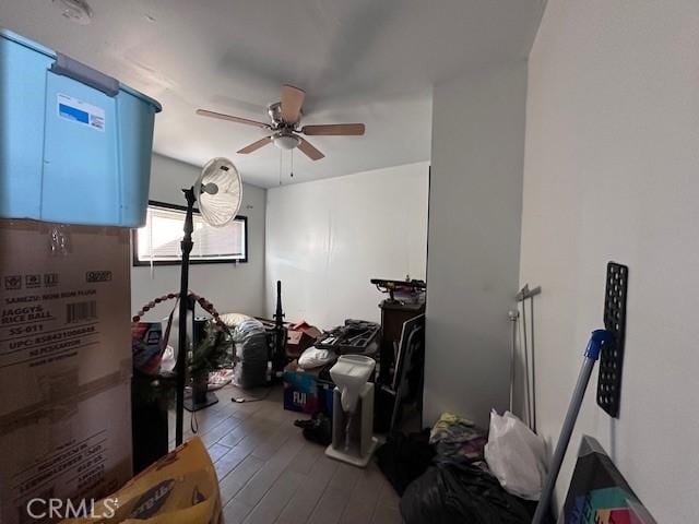 interior space with ceiling fan and hardwood / wood-style flooring