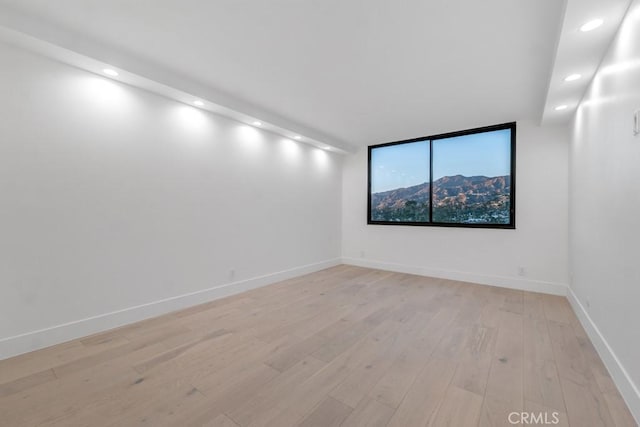 empty room featuring light hardwood / wood-style floors