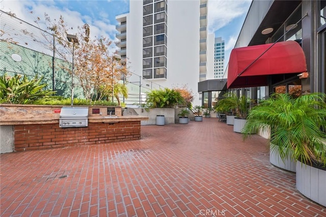 view of property's community featuring exterior kitchen