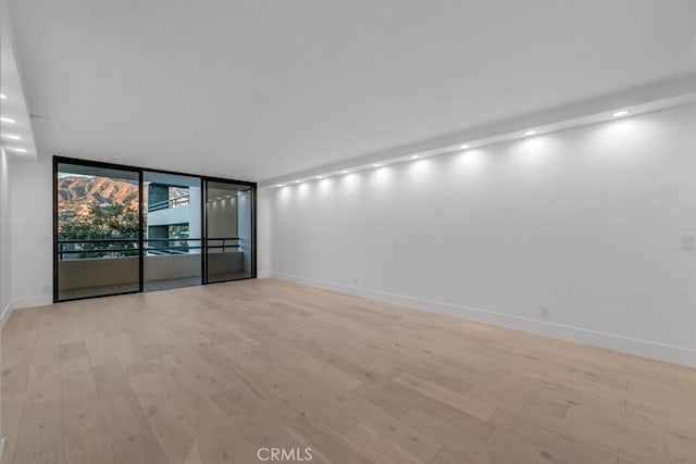 empty room featuring light hardwood / wood-style floors