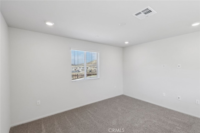 view of carpeted spare room