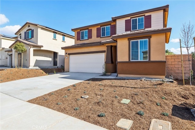 view of front of property featuring a garage