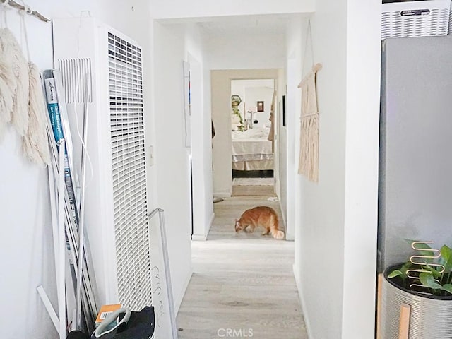 hallway featuring light wood-type flooring