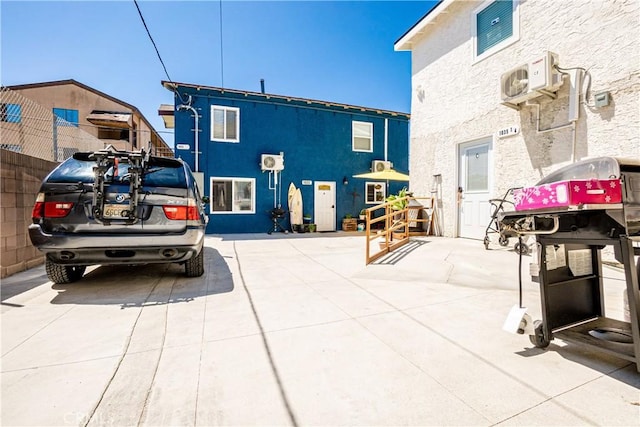 exterior space featuring ac unit