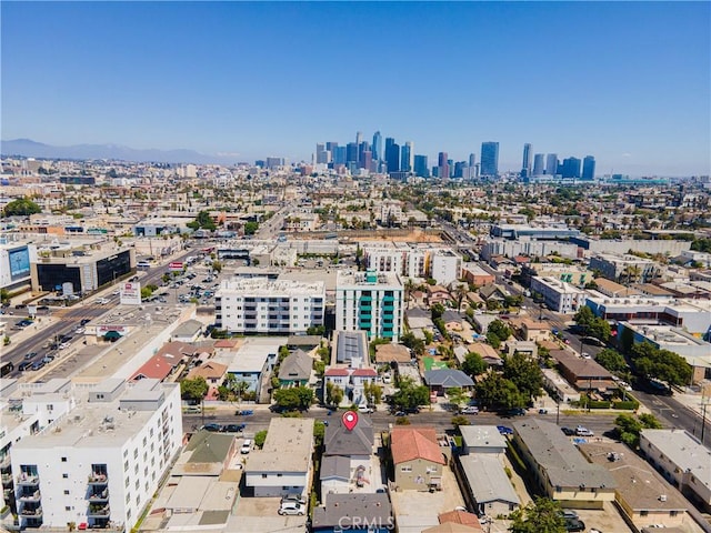 drone / aerial view featuring a mountain view