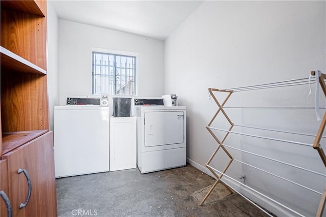 laundry area with washer and clothes dryer