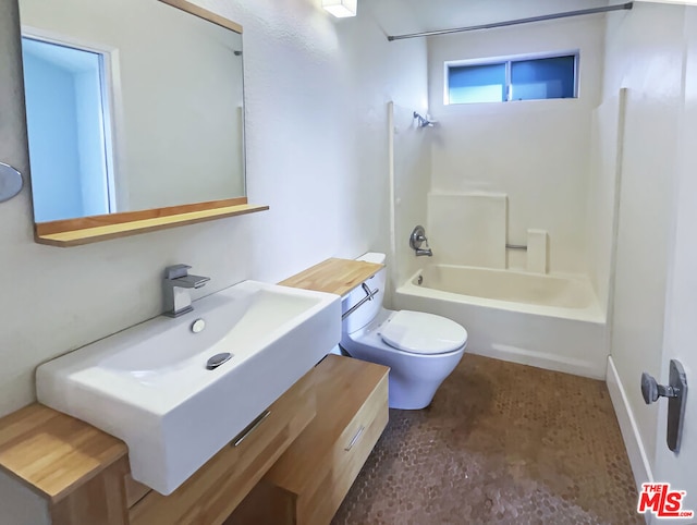 full bathroom with vanity, shower / bathing tub combination, and toilet