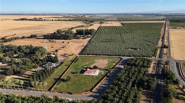 birds eye view of property featuring a rural view