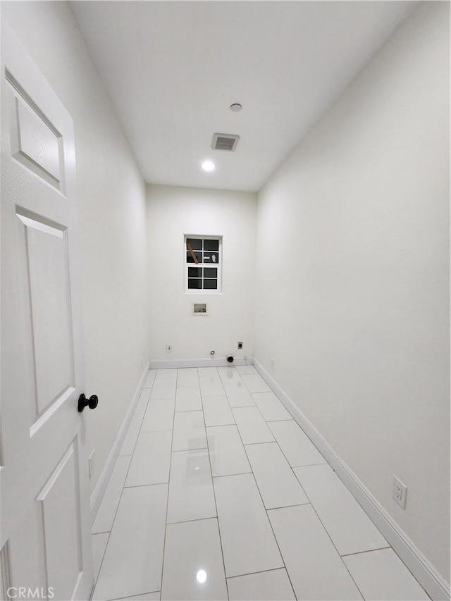 laundry room featuring recessed lighting, hookup for a washing machine, and baseboards