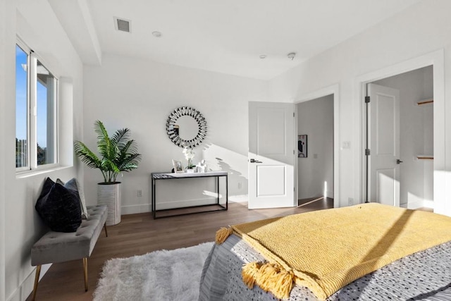 bedroom featuring dark hardwood / wood-style floors