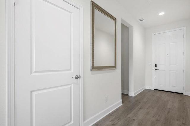 hallway featuring light hardwood / wood-style flooring